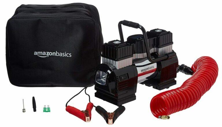 Compresor de aire portátil AmazonBasics con pinza doble de batería + estuche de transporte