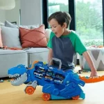 Hot Wheels City T-Rex transportador y pista con 2 vehículos
