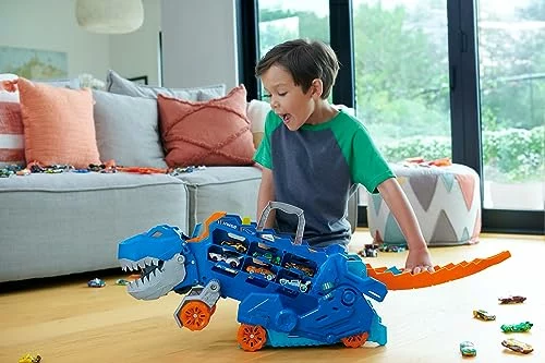 Hot Wheels City T-Rex transportador y pista con 2 vehículos